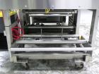 Used API Model DuraTech 2000-S-PH Pharmaceutical Shrink Bundler. Machine is capable of speeds up to 100 bottles/packages per minute (depending on pattern and size). Equipped with 20
