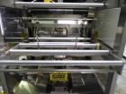 Used API Model DuraTech 2000-S-PH Pharmaceutical Shrink Bundler. Machine is capable of speeds up to 100 bottles/packages per minute (depending on pattern and size). Equipped with 20