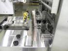 Used API Model DuraTech 2000-S-PH Pharmaceutical Shrink Bundler. Machine is capable of speeds up to 100 bottles/packages per minute (depending on pattern and size). Equipped with 20