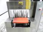 Used API Model DuraTech 2000-S-PH Pharmaceutical Shrink Bundler. Machine is capable of speeds up to 100 bottles/packages per minute (depending on pattern and size). Equipped with 20
