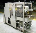 Used API Model DuraTech 2000-S-PH Pharmaceutical Shrink Bundler. Machine is capable of speeds up to 100 bottles/packages per minute (depending on pattern and size). Can handle containers up to 8