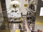 Used API Model DuraTech 2000-S-PH Pharmaceutical Shrink Bundler. Machine is capable of speeds up to 100 bottles/packages per minute (depending on pattern and size). Can handle containers up to 8