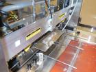 Used API Model DuraTech 2000-S-PH Pharmaceutical Shrink Bundler. Machine is capable of speeds up to 100 bottles/packages per minute (depending on pattern and size). Can handle containers up to 8