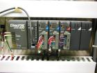 Used API Model DuraTech 2000-S-PH Pharmaceutical Shrink Bundler. Machine is capable of speeds up to 100 bottles/packages per minute (depending on pattern and size). Can handle containers up to 8