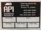 Used API Model DuraTech 2000-S-PH Pharmaceutical Shrink Bundler. Machine is capable of speeds up to 100 bottles/packages per minute (depending on pattern and size). Can handle containers up to 8