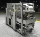 Used API (Lantech) Model DuraTech 2000-S-PH Pharmaceutical Shrink Bundler. Machine is capable of speeds up to 100 bottles/packages per minute (depending on pattern and size). Can handle containers up...