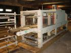 Used Arpac Model 105TW28 Shrink Wrapper with Film Feed Rack and Splicer. Speed up to 36 Wraps per Minute. 6' L x 20
