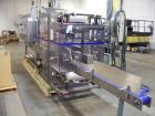 Used- Arpac Model 107-20 Automatic Bundler. Operates by taking a single lane of product and forming it into multipacks. Last...