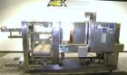 Used Arpac Model 108-28SS Automatic Right Angle Stainless Steel Shrink Bundler. Capable of speeds up to 30 bundles per minute. Package size range: height up to 10