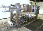 Used Arpac Model 108-28SS Automatic Right Angle Stainless Steel Shrink Bundler. Capable of speeds up to 30 bundles per minute. Package size range: height up to 10