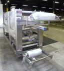 Used Arpac Model 108-28SS Automatic Right Angle Stainless Steel Shrink Bundler. Capable of speeds up to 30 bundles per minute. Package size range: height up to 10