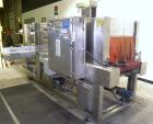 Used Arpac Model 108-28SS Automatic Right Angle Stainless Steel Shrink Bundler. Capable of speeds up to 30 bundles per minute. Package size range: height up to 10