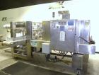 Used Arpac Model 108-28SS Automatic Right Angle Stainless Steel Shrink Bundler. Capable of speeds up to 30 bundles per minute. Package size range: height up to 10