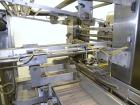 Used Arpac Model 108-28SS Automatic Right Angle Stainless Steel Shrink Bundler. Capable of speeds up to 30 bundles per minute. Package size range: height up to 10