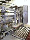 Used Arpac Model 108-28SS Automatic Right Angle Stainless Steel Shrink Bundler. Capable of speeds up to 30 bundles per minute. Package size range: height up to 10