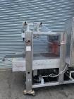 Used Arpac Model 112-SS-24 Automatic Stainless Steel Inline Shrink Bundler. Capable of speeds from 5 to 25 bundles per minute (depending on application). Unit has a 28