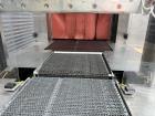 Used Arpac Model 112-SS-24 Automatic Stainless Steel Inline Shrink Bundler. Capable of speeds from 5 to 25 bundles per minute (depending on application). Unit has a 28
