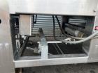 Used Arpac Model 112-SS-24 Automatic Stainless Steel Inline Shrink Bundler. Capable of speeds from 5 to 25 bundles per minute (depending on application). Unit has a 28