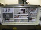 Used Arpac Model 25TW-28 Automatic Shrink Bundler. Capable of speeds up to 25 trays per minute. Product size range: (Width) 6