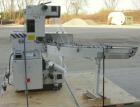 Used Omega Design DL-27 Dual Lane Shrink Bundler. Capable of speeds up to 240 BPM. Maximum product height 11