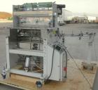 Used Omega Design DL-27 Dual Lane Shrink Bundler. Capable of speeds up to 240 BPM. Maximum product height 11