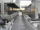 Used Omega Design DL-27 Dual Lane Shrink Bundler. Capable of speeds up to 240 BPM. Maximum product height 11