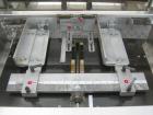 Used Omega Design DL-27 Dual Lane Shrink Bundler. Capable of speeds up to 240 BPM. Maximum product height 11