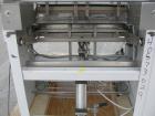 Used Omega Design DL-27 Dual Lane Shrink Bundler. Capable of speeds up to 240 BPM. Maximum product height 11