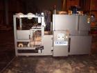 Used Dorell Sleeve Wrapper, Model SW20AICST1220. Automatic right angle with integrated tunnel rated up to 20 bundles per minute. Features 20
