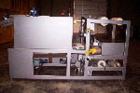 Used Dorell Sleeve Wrapper, Model SW20AICST1220. Automatic right angle with integrated tunnel rated up to 20 bundles per minute. Features 20