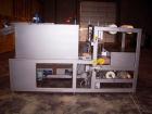 Used Dorell Sleeve Wrapper, Model SW20AICST1220. Automatic right angle with integrated tunnel rated up to 20 bundles per minute. Features 20