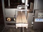 Used Dorell Sleeve Wrapper, Model SW20AICST1220. Automatic right angle with integrated tunnel rated up to 20 bundles per minute. Features 20