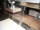 Used Dorell Sleeve Wrapper, Model SW20AICST1220. Automatic right angle with integrated tunnel rated up to 20 bundles per minute. Features 20
