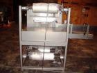Used Dorell Sleeve Wrapper, Model SW20AICST1220. Automatic right angle with integrated tunnel rated up to 20 bundles per minute. Features 20
