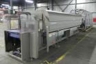 Used Douglas Contour Model M-75 Multi-Pack Shrink Bundler capable of speeds up to 75 cycles per minute. Now configured for print registered film, unsupported 8 oz and 11 oz bottles in multiple lanes,...
