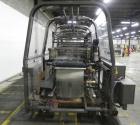 Used Douglas Contour Model M-75 Multi-Pack Shrink Bundler capable of speeds up to 75 cycles per minute. Now configured for print registered film, unsupported 8 oz and 11 oz bottles in multiple lanes,...