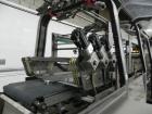 Used Douglas Contour Model M-75 Multi-Pack Shrink Bundler capable of speeds up to 75 cycles per minute. Now configured for print registered film, unsupported 8 oz and 11 oz bottles in multiple lanes,...