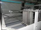 Used Douglas Contour Model M-75 Multi-Pack Shrink Bundler capable of speeds up to 75 cycles per minute. Now configured for print registered film, unsupported 8 oz and 11 oz bottles in multiple lanes,...