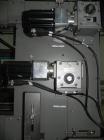 Used Douglas Contour Model M-75 Multi-Pack Shrink Bundler capable of speeds up to 75 cycles per minute. Now configured for print registered film, unsupported 8 oz and 11 oz bottles in multiple lanes,...