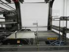 Used Douglas Contour Model M-75 Multi-Pack Shrink Bundler capable of speeds up to 75 cycles per minute. Now configured for print registered film, unsupported 8 oz and 11 oz bottles in multiple lanes,...