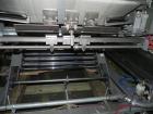 Used Douglas Contour Model M-75 Multi-Pack Shrink Bundler capable of speeds up to 75 cycles per minute. Now configured for print registered film, unsupported 8 oz and 11 oz bottles in multiple lanes,...