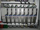 Used Douglas Contour Model M-75 Multi-Pack Shrink Bundler capable of speeds up to 75 cycles per minute. Now configured for print registered film, unsupported 8 oz and 11 oz bottles in multiple lanes,...