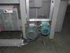 Used Douglas Contour Model M-75 Multi-Pack Shrink Bundler capable of speeds up to 75 cycles per minute. Now configured for print registered film, unsupported 8 oz and 11 oz bottles in multiple lanes,...