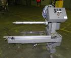 Used Douglas Contour Model M-75 Multi-Pack Shrink Bundler capable of speeds up to 75 cycles per minute. Now configured for print registered film, unsupported 8 oz and 11 oz bottles in multiple lanes,...