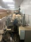 Used Douglas VS-25 Shrink Wrapper | Up to 25 CPM | 6–17