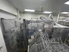 Used EDL Model Side Feed Automatic Stainless Steel Shrink Bundler with Integrated Heat Shrink Tunnel.