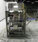 Used Great Lakes Model 708 E-27 Shrink Bundler capable of speeds up to 15 bundles per minute (depending on container size and pack pattern). Will handle bundles up to 12