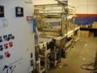 USED: Great Lakes shrink wrap machine, model HVP5/6011/C5 and 1648. Unit comes with infeed conveyor, 2 roll (top and bottom)...