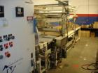 USED: Great Lakes shrink wrap machine, model HVP5/6011/C5 and 1648. Unit comes with infeed conveyor, 2 roll (top and bottom) bundler, shrink tunnel and control panel. Unit is reported capable of runn...