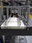 Used IMA BFB MS300 Shrink Bundler or stretch banding machine for carton multi-packing. Capable of speeds up to 40 bundles per minute. Uses PE type films. Max film speed to 150' per minute. Inline and...